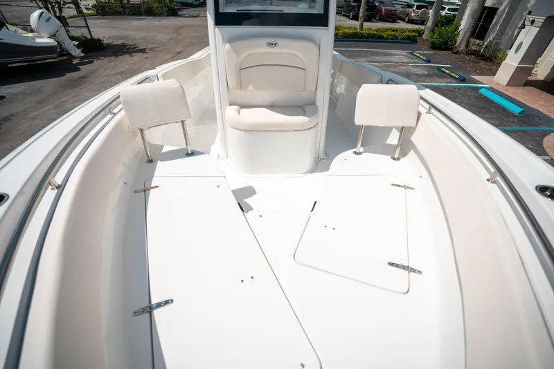 Slide: The Image of 2025 Sea Hunt Ultra 239 SE boat interior with seating and storage compartments. - 48