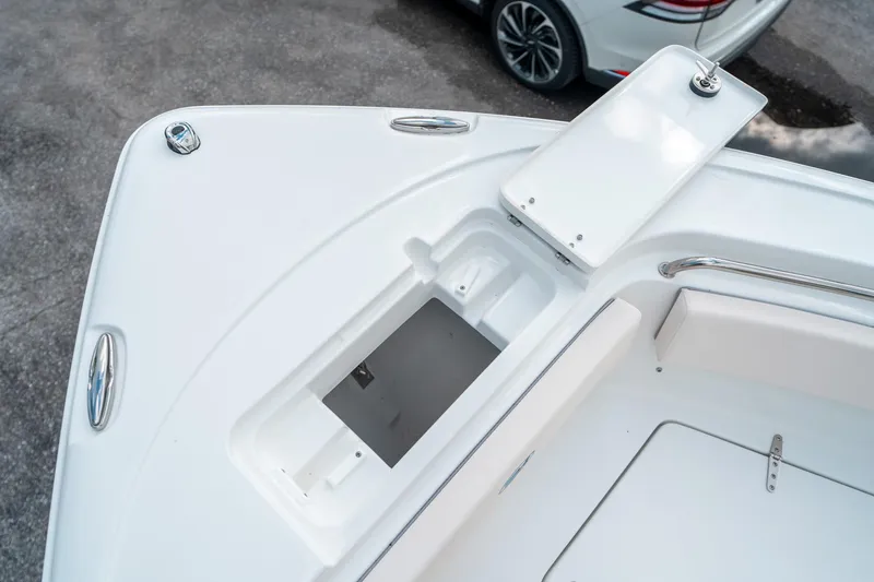 Slide: The Image of 2025 Sea Hunt Ultra 239 SE boat deck with storage compartment, viewed from above. - 47