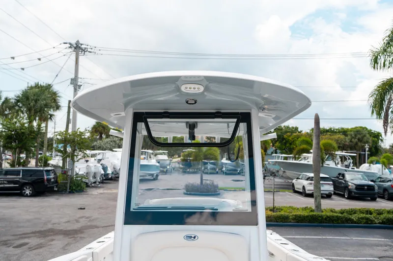 Slide: The Image of 2025 Sea Hunt Ultra 275 SE boat, featuring a sleek helm and modern design. - 40