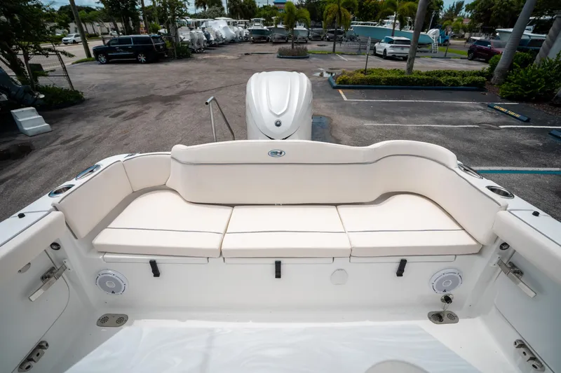 Slide: The Image of 2025 Sea Hunt Ultra 255 SE boat with spacious rear seating area. - 10