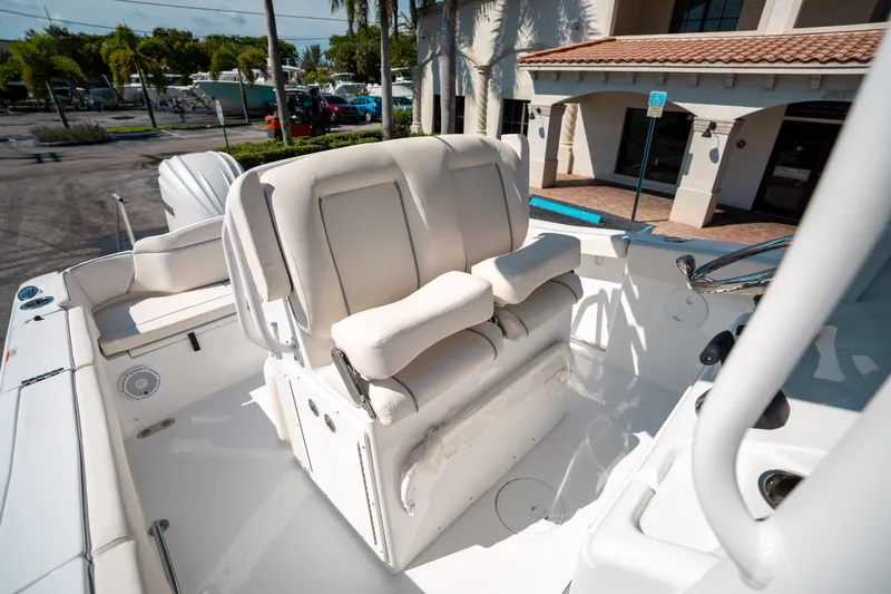 Slide: The Image of 2025 Sea Hunt Ultra 255 SE boat interior with comfortable seating and modern design. - 28
