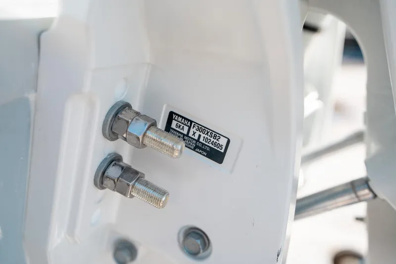 Slide: The Image of Close-up of Yamaha motor bolts on 2025 Sea Hunt Ultra 255 SE boat. - 43