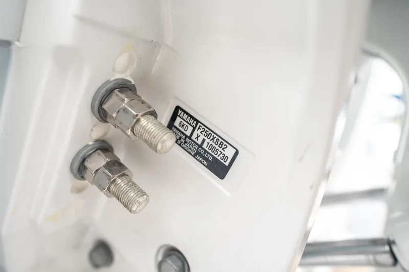Slide: The Image of Close-up of Yamaha F250XSB2 engine bolts on 2025 Sea Hunt GAMEFISH 27 CB. - 36