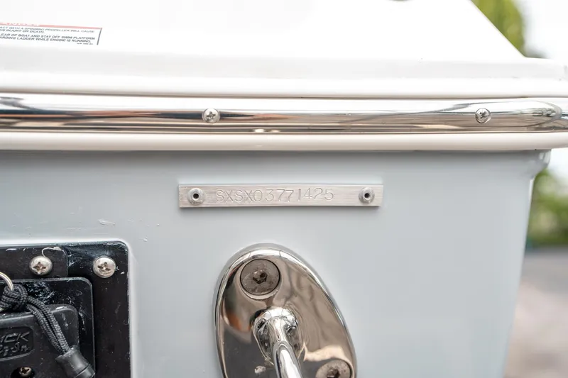 Slide: The Image of 2025 Sea Hunt GAMEFISH 27 CB boat detail with serial number plate. - 37