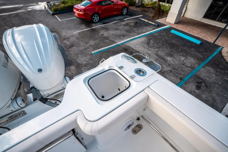 Slide: The Image of 2025 Sea Hunt Gamefish 30 FS boat with dual engines and fishing station. - 15