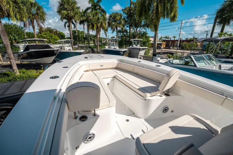 Slide: The Image of 2025 Sea Hunt Gamefish 30 FS boat with spacious seating and sleek design. - 32