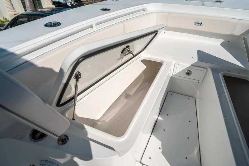 Slide: The Image of 2025 Sea Hunt Gamefish 30 FS boat storage compartment, open and spacious design. - 40