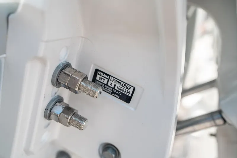 Slide: The Image of Close-up of Yamaha engine bolts on a 2025 Sea Hunt Gamefish 30 FS boat. - 45