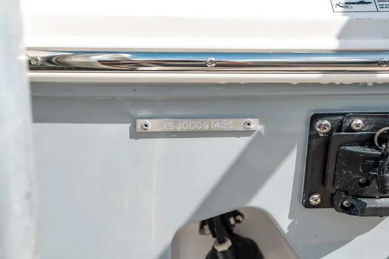 Slide: The Image of 2025 Sea Hunt Gamefish 30 FS boat hull identification number plate. - 47
