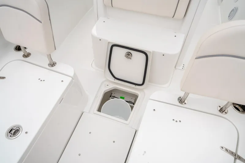 Slide: The Image of Interior of 2025 Sea Hunt Gamefish 27 FS boat, featuring storage compartments and seating. - 43