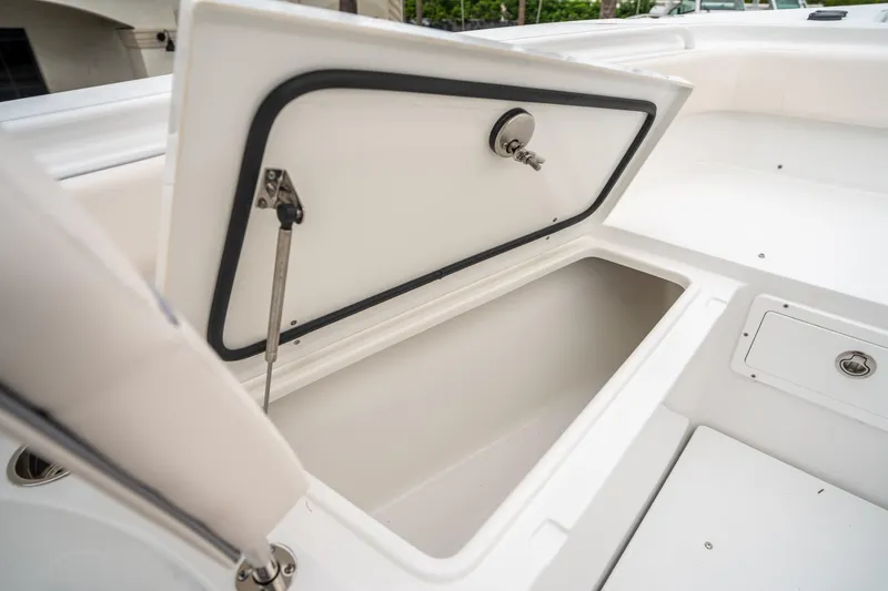 Slide: The Image of Open storage compartment on 2025 Sea Hunt Gamefish 27 FS boat. - 41