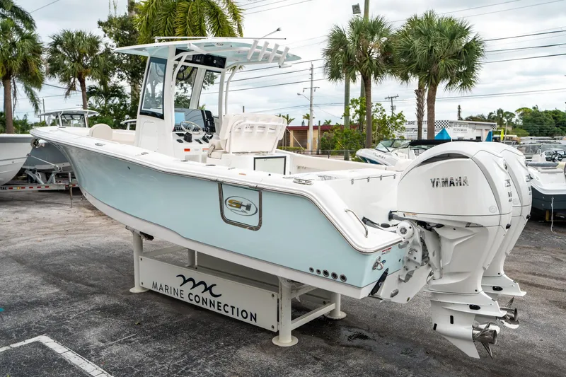 Slide: The Image of 2025 Sea Hunt Gamefish 27 FS boat with Yamaha engines, displayed at Marine Connection. - 4