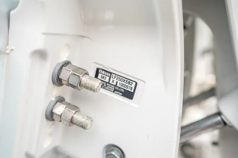 Slide: The Image of Close-up of Yamaha engine bolts on 2025 Sea Hunt Gamefish 27 FS boat. - 46