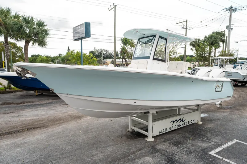 Slide: The Image of 2025 Sea Hunt Gamefish 27 FS boat displayed at Marine Connection dealership. - 6