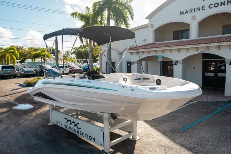Slide: The Image of 2025 Hurricane SunDeck Sport 185 OB boat displayed at Marine Connection dealership. - 8