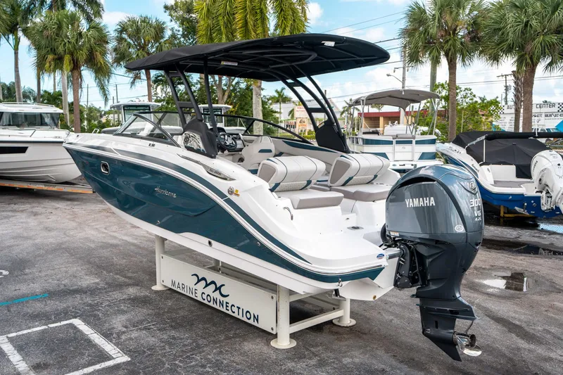Slide: The Image of 2025 Hurricane SunDeck 2600 OB boat with Yamaha engine, displayed at Marine Connection. - 4