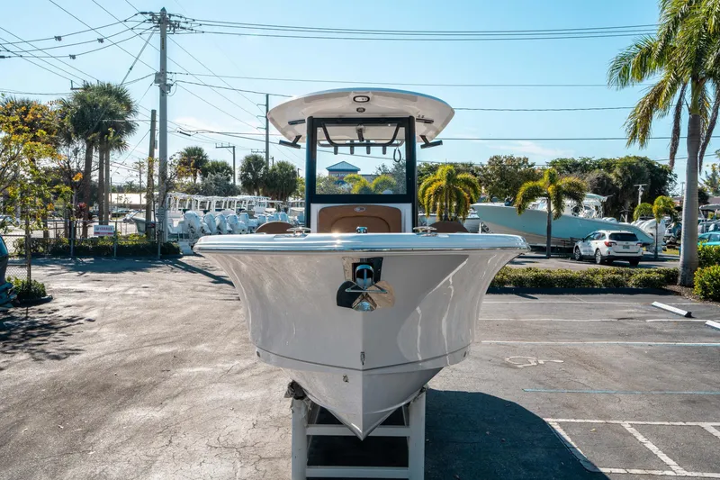 Slide: The Image of 2025 Sea Hunt Ultra 255 SE boat displayed in a sunny outdoor setting. - 7