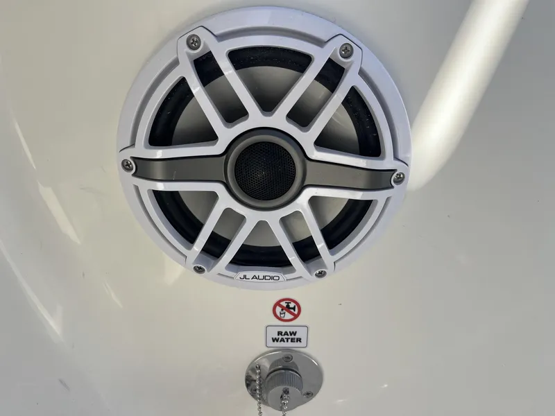 Slide: The Image of JL Audio speaker and raw water access on 2025 Pathfinder 2400 TRS boat. - 29