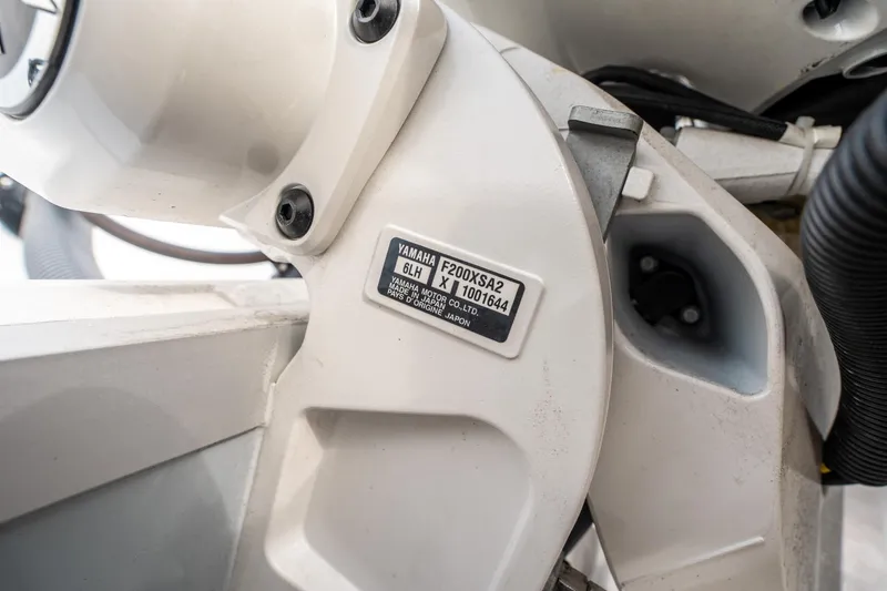 Slide: The Image of Close-up of Yamaha engine part on 2025 Sea Hunt Ultra 275 SE boat. - 45