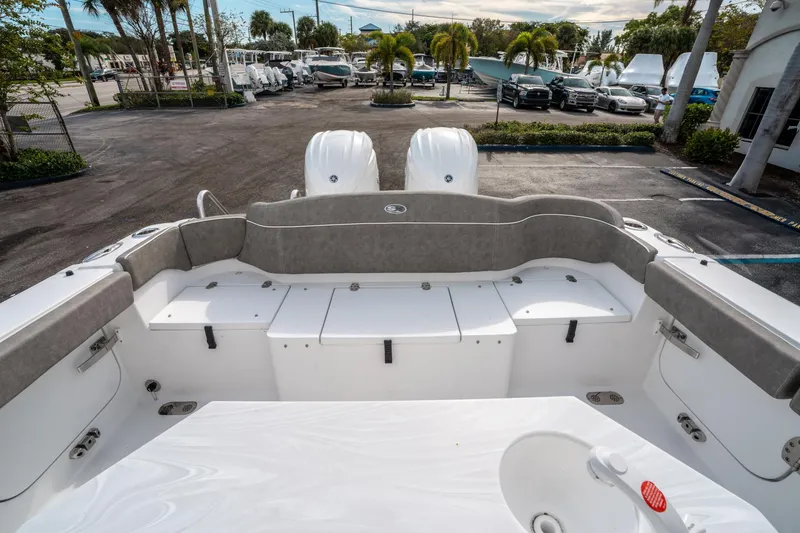 Slide: The Image of 2025 Sea Hunt Ultra 275 SE boat interior with seating and storage compartments. - 13