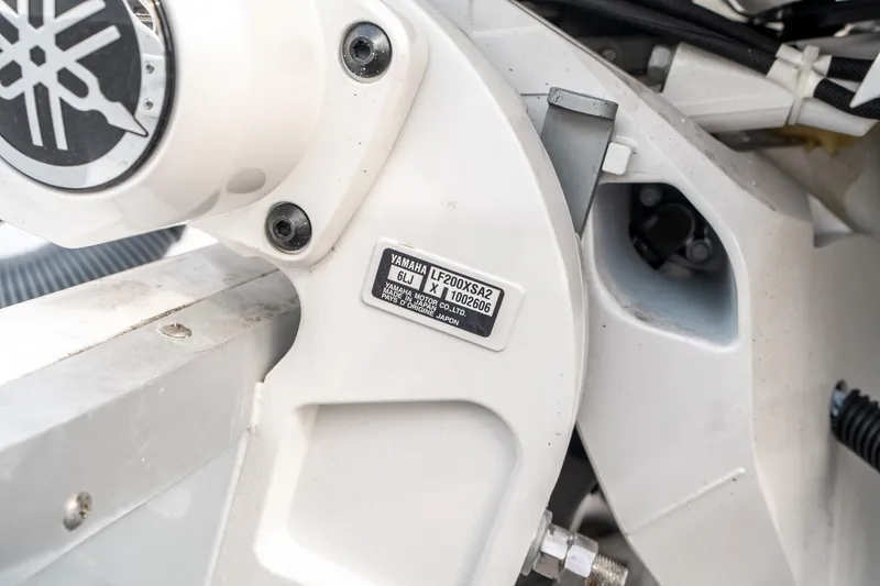 Slide: The Image of Close-up of Yamaha engine part on 2025 Sea Hunt Ultra 275 SE boat. - 44