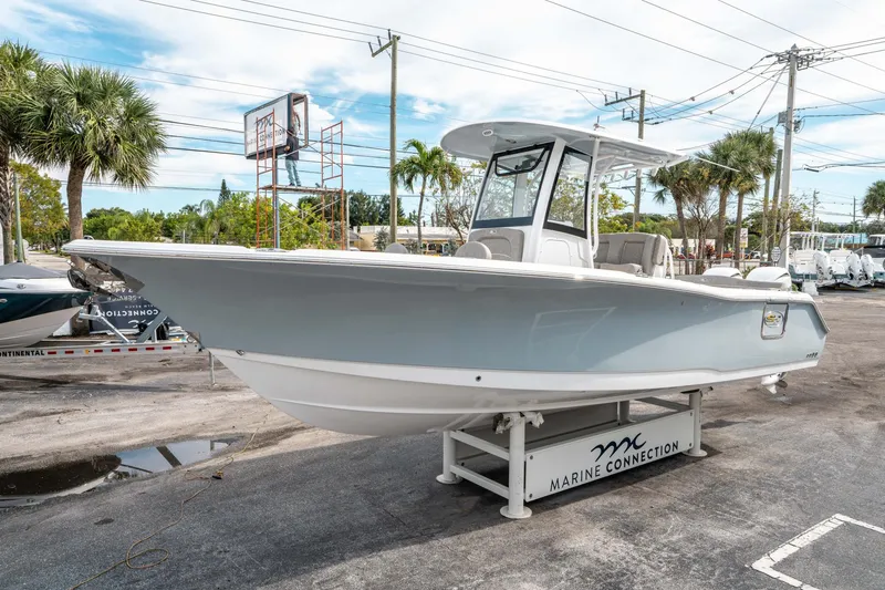 Slide: The Image of 2025 Sea Hunt Ultra 275 SE boat displayed at Marine Connection dealership. - 6