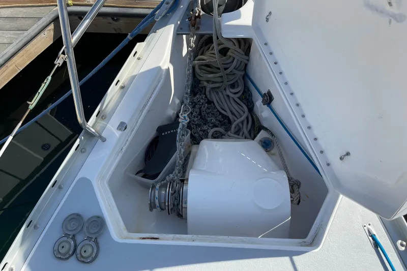 Slide: The Image of Anchor locker of 1998 Hunter Passage 42 sailboat with ropes and winch. - 14