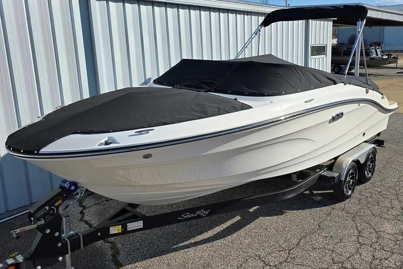 Slide: The Image of 2025 Sea Ray SPX 210 BR boat on trailer, covered. - 11