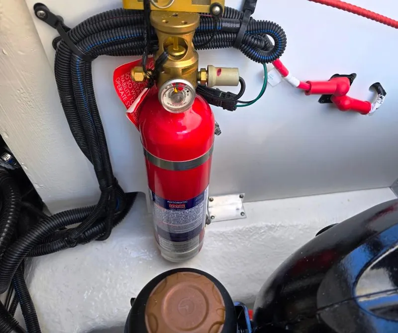 Slide: The Image of Automatic Fire extinguisher in engine compartment. - 20