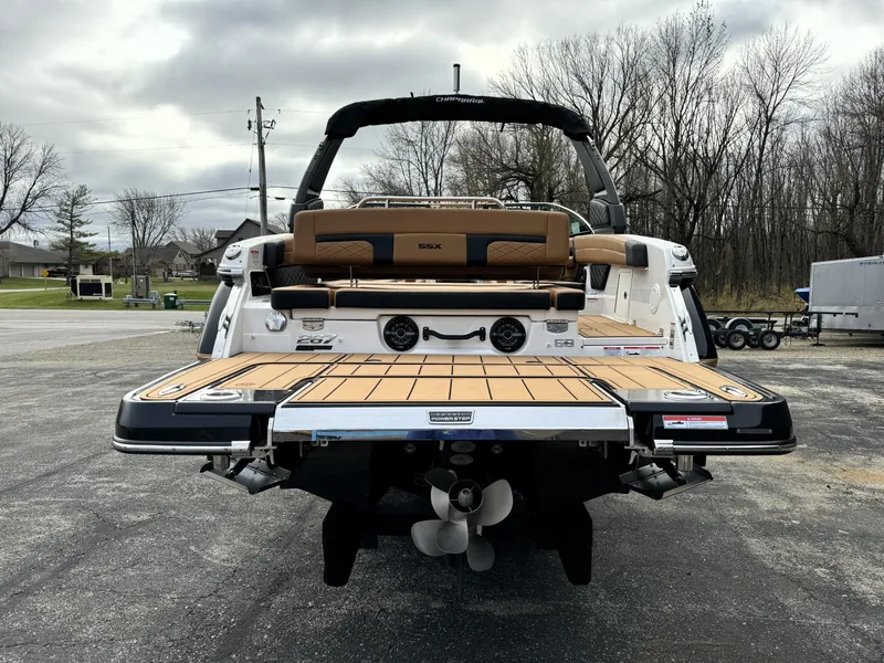 Slide: The Image of 2025 Chaparral 267 SSX boat rear view with swim platform and seating. - 3