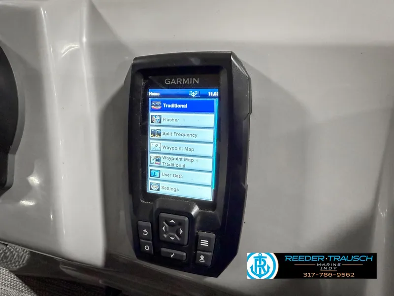Slide: The Image of Garmin device on 2023 Bennington 208 SL boat dashboard, displaying navigation options. - 37
