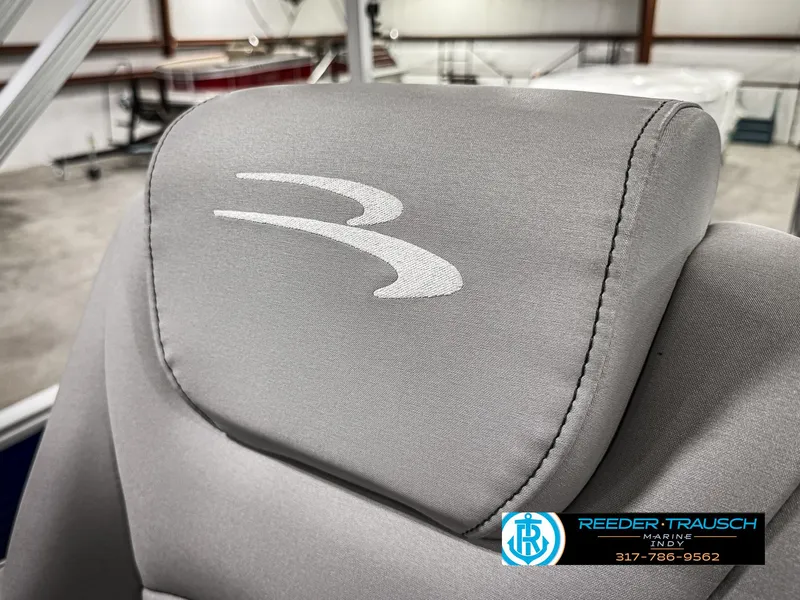 Slide: The Image of 2023 Bennington 208 SL boat seat with logo in showroom. - 40