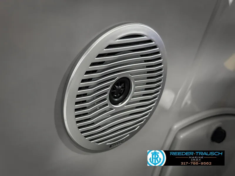 Slide: The Image of 2023 Bennington 208 SL boat speaker detail with Reeder-Trausch Marine logo. - 43