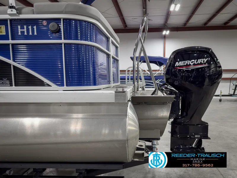 Slide: The Image of 2023 Bennington 208 SL pontoon boat with Mercury engine in showroom. - 44