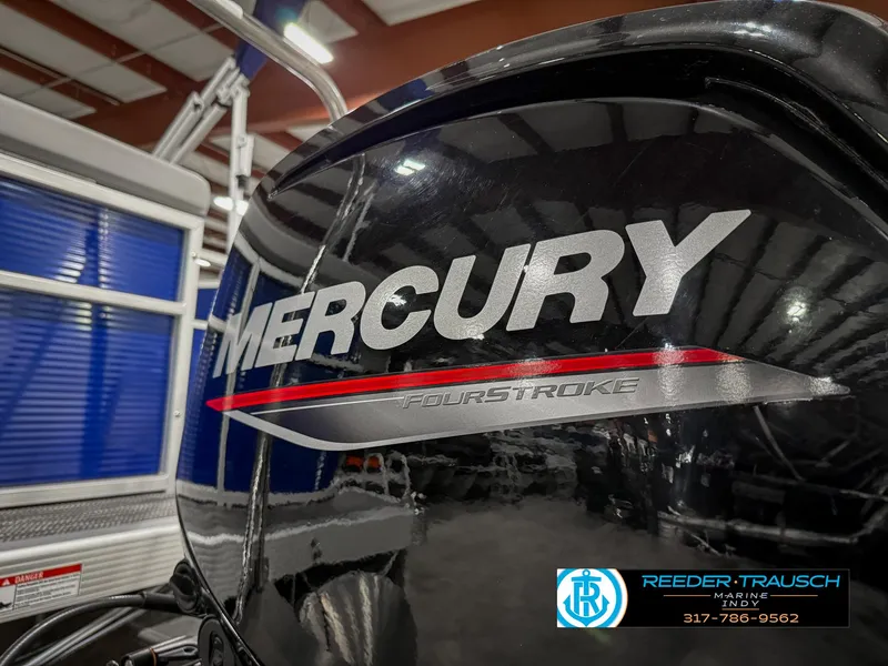Slide: The Image of Mercury FourStroke engine on a 2023 Bennington 208 SL boat, indoor showroom. - 45