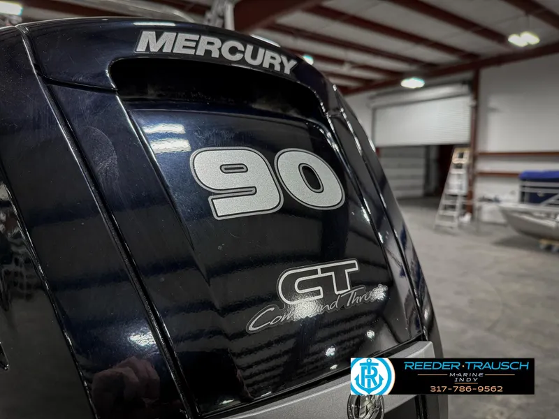 Slide: The Image of Mercury 90 CT Command Thrust engine on 2023 Bennington 208 SL boat in warehouse. - 46