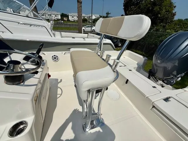 Slide: The Image of 2025 Bulls Bay 2200 boat interior with helm seat and steering wheel. - 7