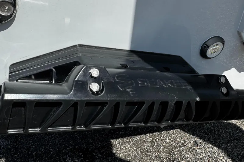 Slide: The Image of Seakeeper component on 2025 Tidewater 282 CC Adventure boat, close-up view. - 13