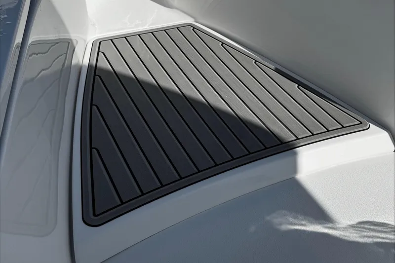 Slide: The Image of 2025 Tidewater 282 CC Adventure boat deck with non-slip surface. - 27