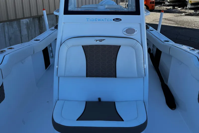 Slide: The Image of 2025 Tidewater 232 LXF boat interior with seating and console. - 11