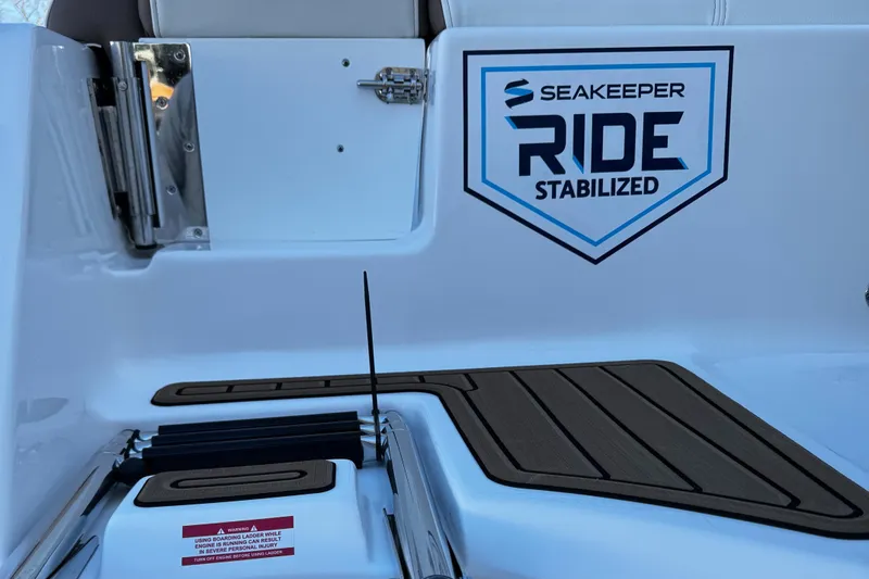 Slide: The Image of 2025 Tidewater 232 LXF boat with Seakeeper Ride stabilization feature. - 18