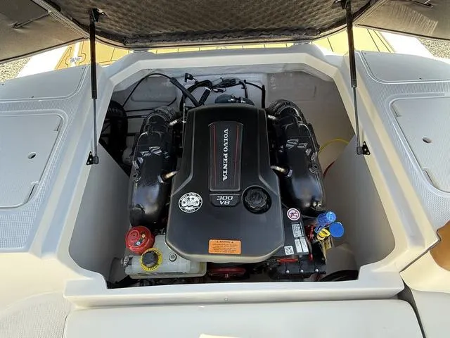 Slide: The Image of 2025 Chaparral 23 SSi boat engine compartment with Volvo Penta 300 V8 engine. - 20