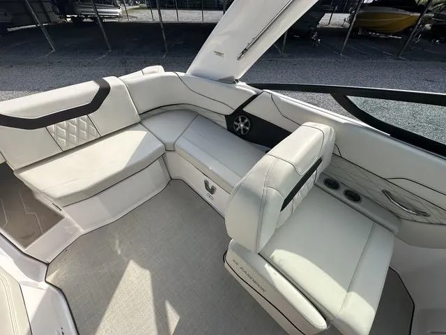 Slide: The Image of Luxurious interior of 2022 Regal 22 FasDeck boat with white seating and modern design. - 16