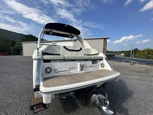 Slide: The Image of 2022 Regal 22 FasDeck boat rear view with swim platform and seating. - 7