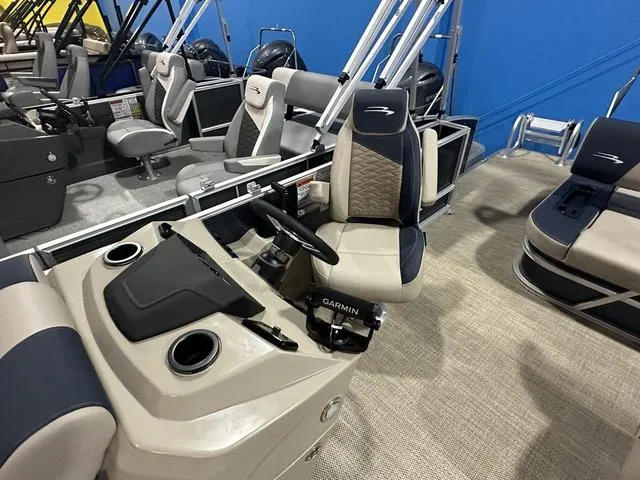 Slide: The Image of 2024 Bennington 22' SSB pontoon boat interior with Garmin navigation system. - 7