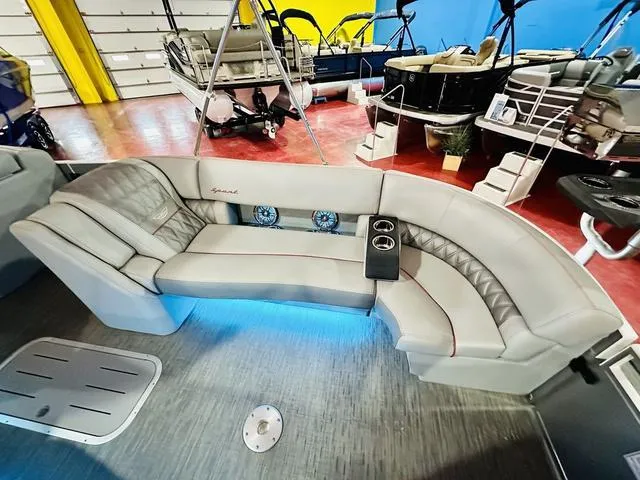 Slide: The Image of Luxurious seating on 2023 Bennington 25 RXSBA pontoon boat with ambient lighting. - 14
