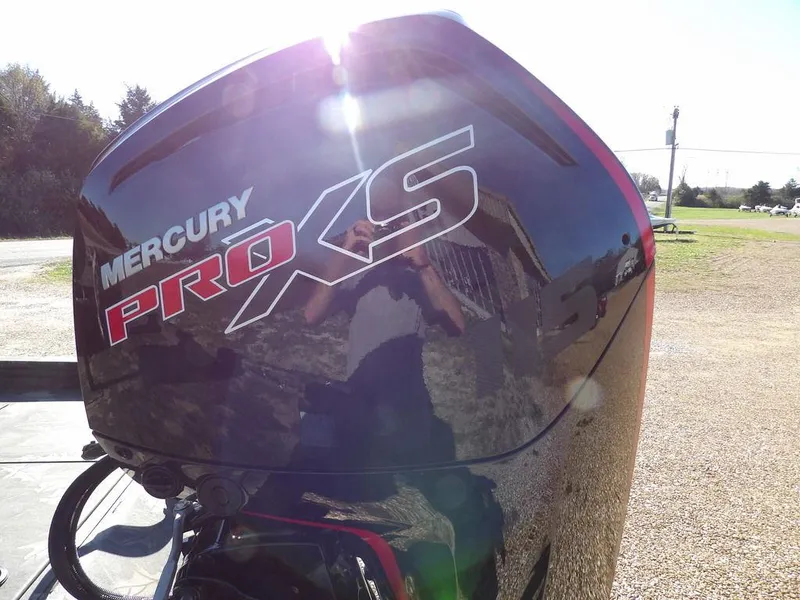 Slide: The Image of Mercury Pro XS engine on 2025 Crestliner XFC 189, reflecting sunlight outdoors. - 39