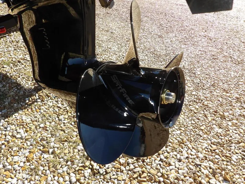 Slide: The Image of Propeller of 2025 Crestliner XFC 189 boat on gravel surface. - 40