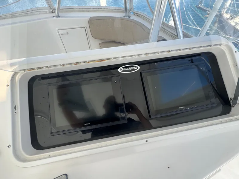 Slide: The Image of Control panel of 2000 Ocean Yachts 48 Convertible with dual screens. - 35