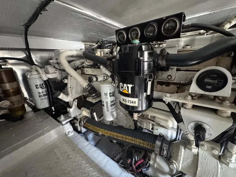 Slide: The Image of Engine room of 2000 Ocean Yachts 48 Convertible with CAT components and gauges. - 41